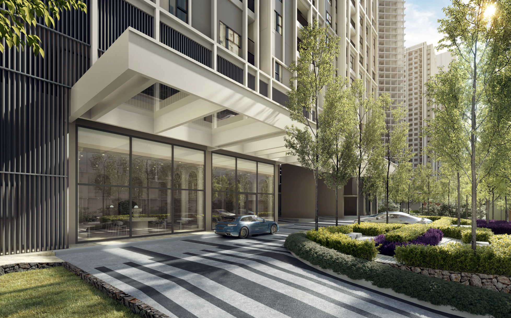 The sheltered residential drop-off at The Aldenz with a covered canopy and landscaped verges